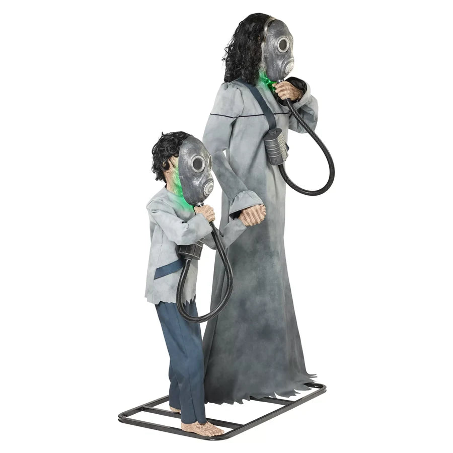 Side view of the pair, the taller figure at full height beside the shorter one
