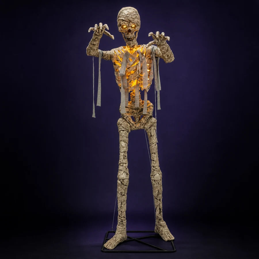 Wrackmoor 11 ft Mummy on a dark violet studio backdrop, arms raised in a claw pose