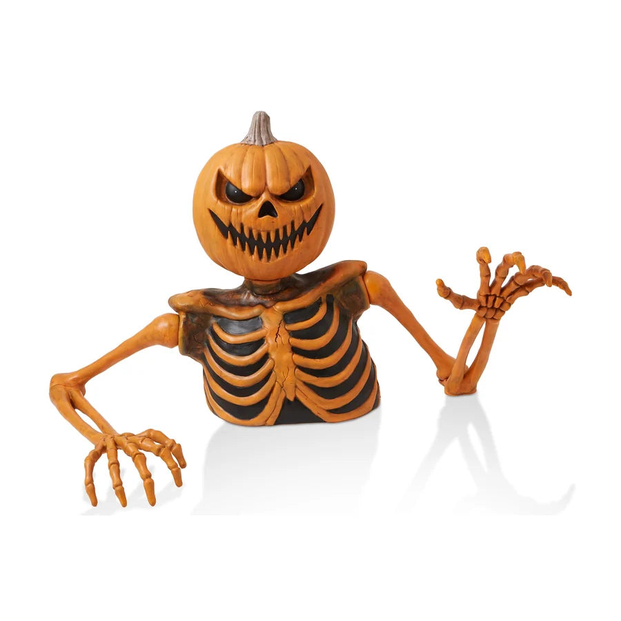 A pumpkin-headed skeleton groundbreaker with long clawed arms, coming out of the ground