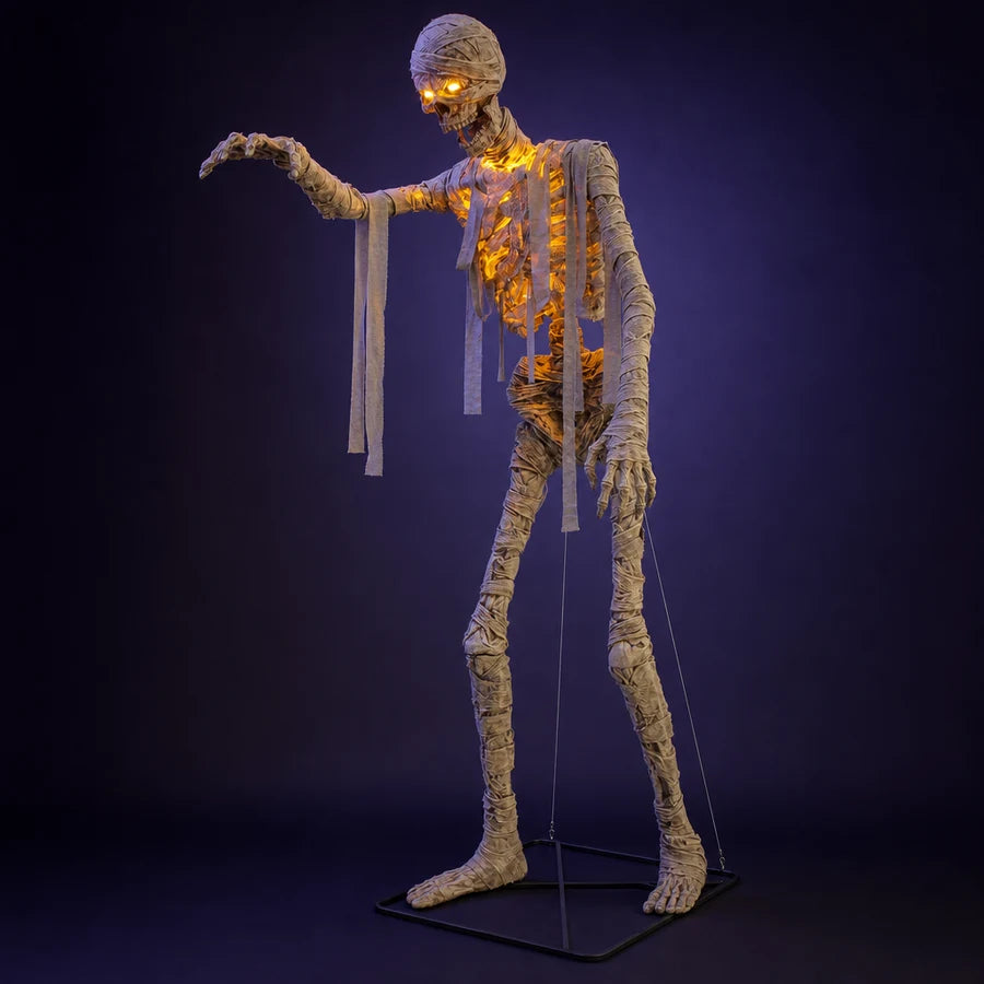 Wrackmoor 11 ft Mummy on a dark studio backdrop, one arm reaching forward