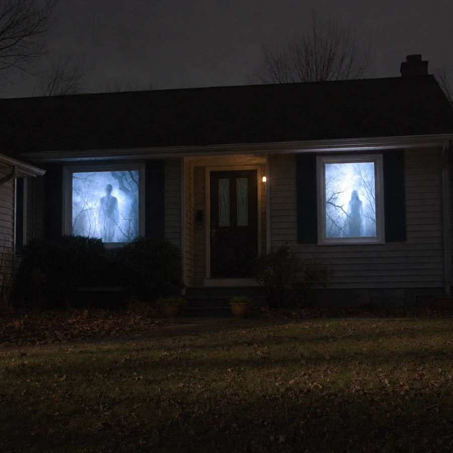 Two windows on the same house glowing at once, one on each side of the front door