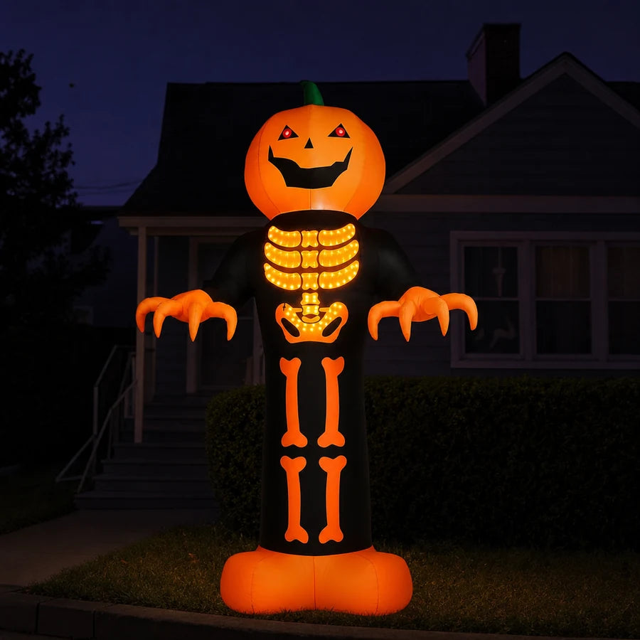 Seen from the sidewalk at night, the lit reaper the tallest thing on the block