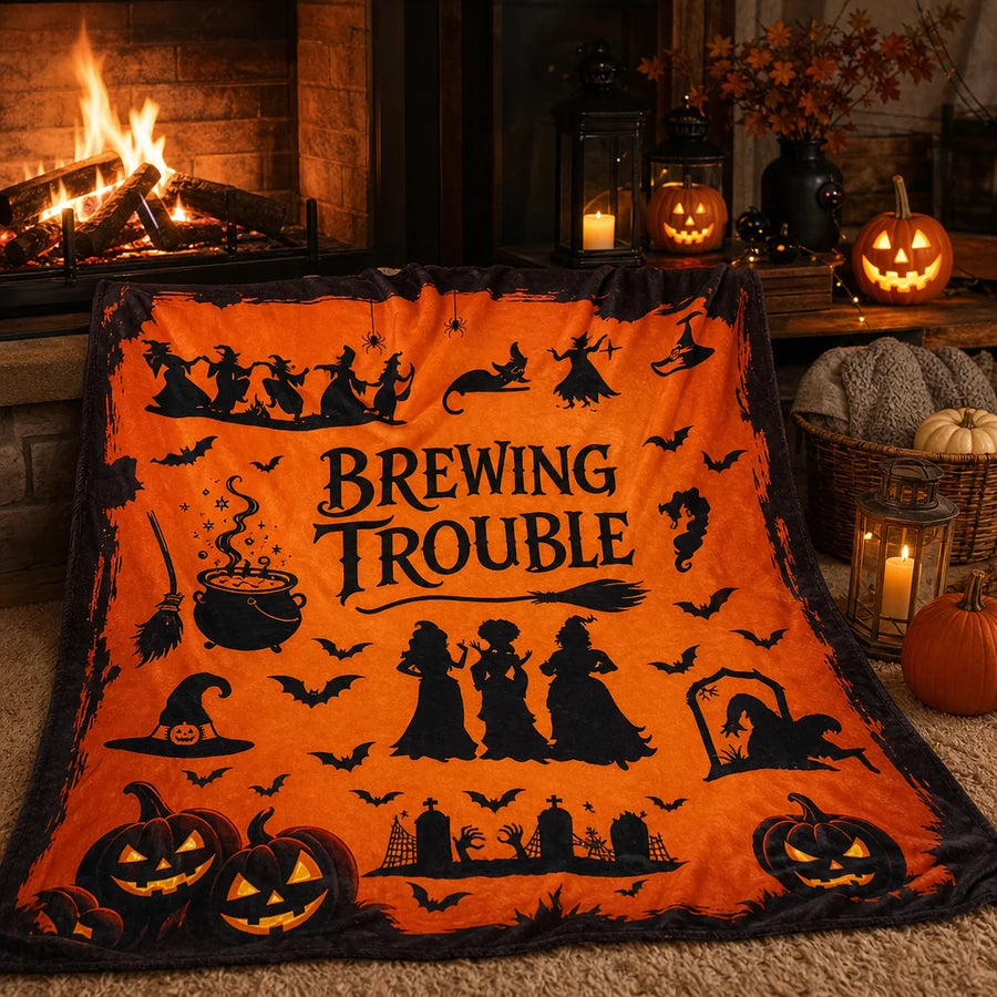 Rumpled on a rug by a lit fireplace, warm firelight across the print