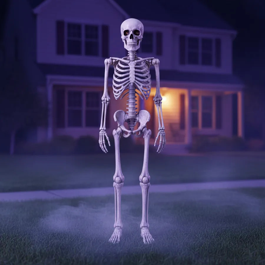 Nightwatch 7 ft Poseable Skeleton set up on a suburban front lawn at night, lit against the house