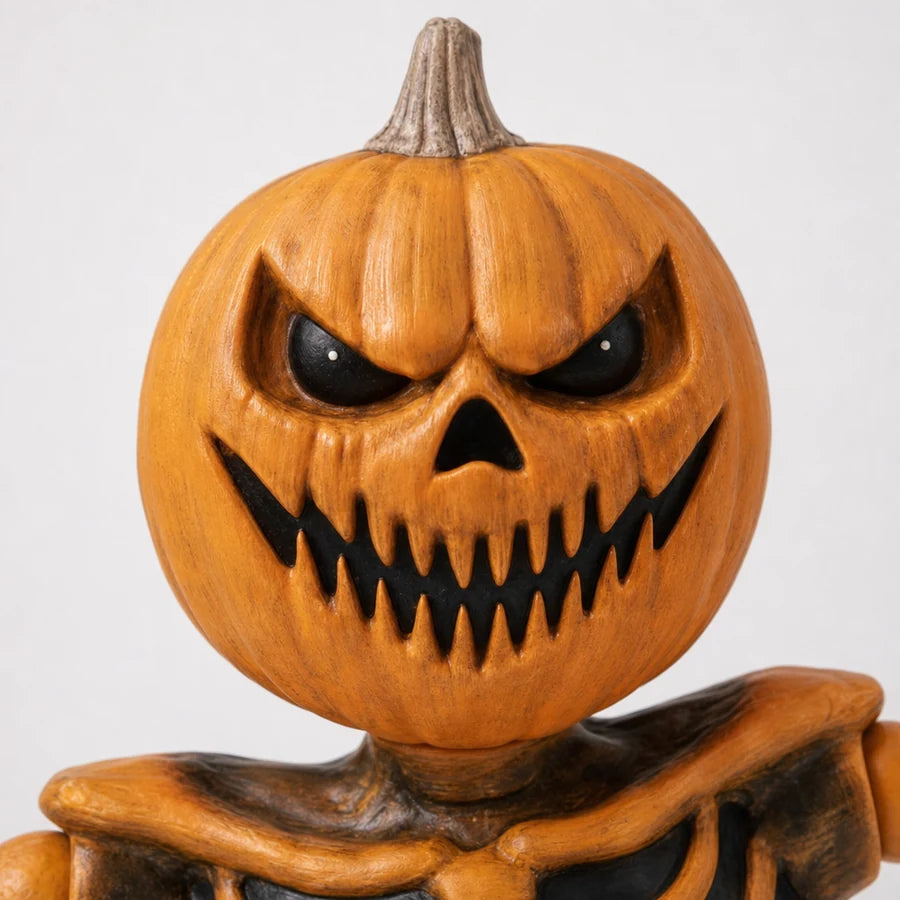 Close crop of the carved jack-o'-lantern face, its eyes and jagged teeth in sharp detail