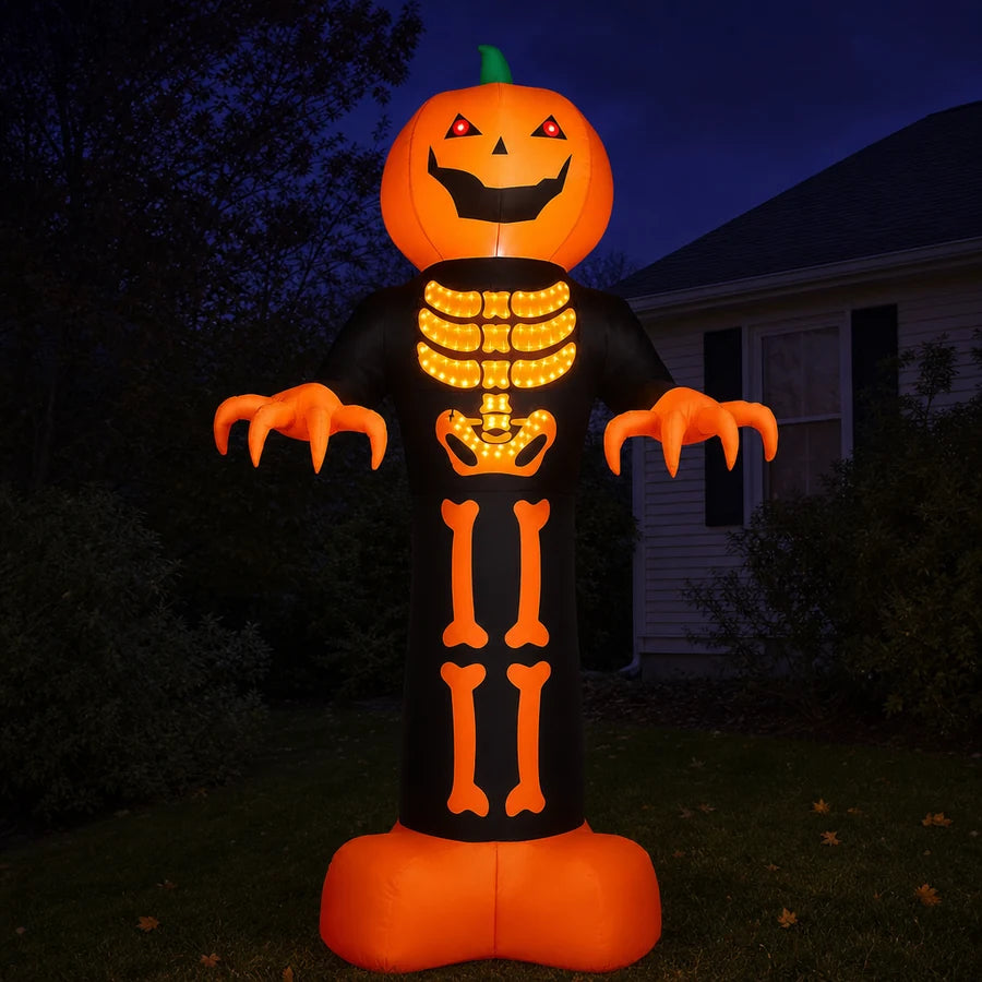 The reaper lit at night on the same lawn, all 118 LEDs glowing against the dark yard