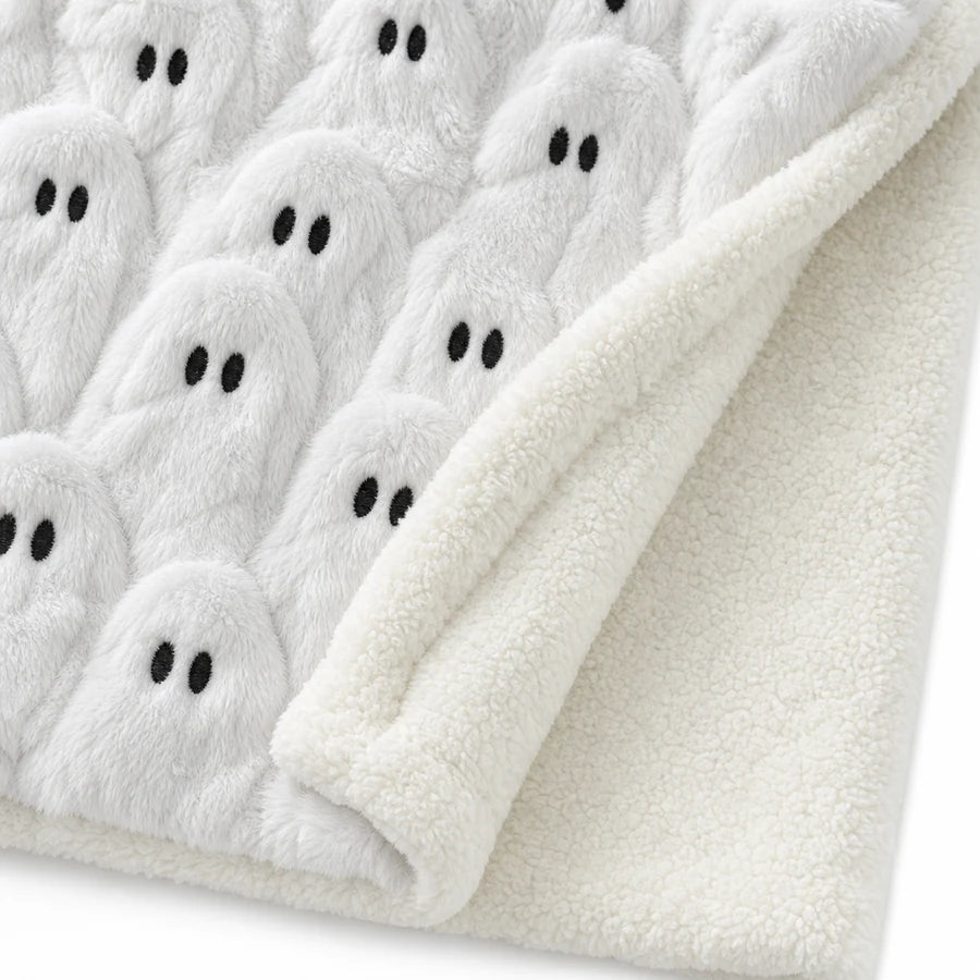 One corner folded back showing the ghost-texture front and the plain sherpa back